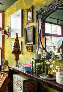House SFW store featuring hand blocked linen wallpaper, vintage mirror, and table top decor, photography by Hulya Kolabas