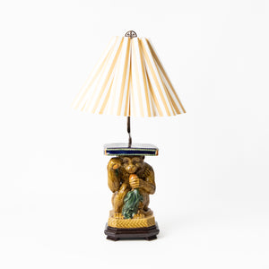 FRUIT THROWING MONKEY LAMP WITH STRIPED SHADE