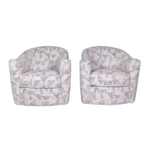 PAIR OF SWIVEL CHAIRS IN PATTERNED WOOL BOUCLE